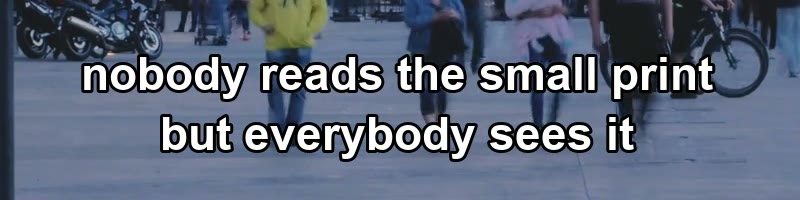 Caption with pedestrians walking behind it — 100% crop of the input